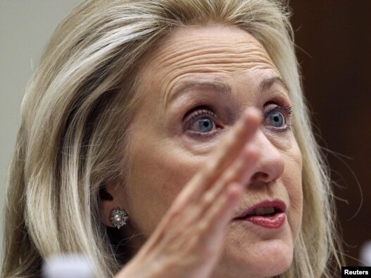 U.S. Secretary of State Hillary Clinton gestures during a hearing of the House Foreign Affairs Committee today.