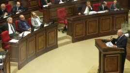 Armenia -- Armenia's General Prosecutor Aghvan Hovsepian (R) asks the parliament to allow NA deputy Vartan Oskanian's prosecution in a criminal case of alleged money laundering, 1Oct, 2012