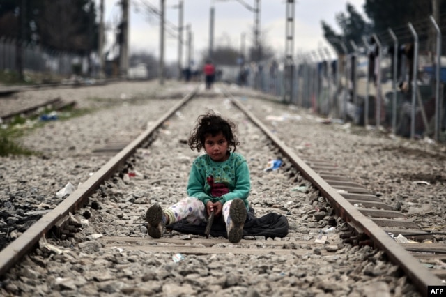 A child plays on a rail track at the Greek-Macedonian border near the Greek village of Idomeni on March 7.