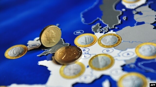 Kovanica britanske funte među evrima - ilustracija
