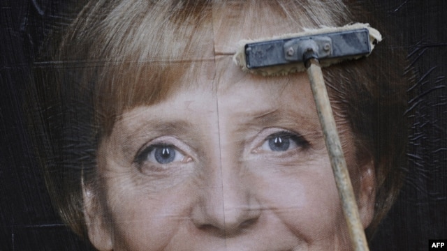 A campaign billboard in Berlin of Chancellor Angela Merkel, whose Christian Democrats looked in a position for reelection in late polling.