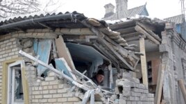 Дом в Донецке, разрушенный в результате обстрела