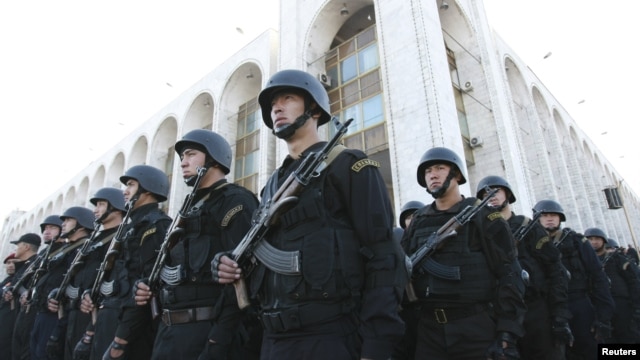 Kyrgyz security forces in Bishkek stand in formation during preparations for heightened security measures ahead of a presidential election in the Central Asian country in 2011. 