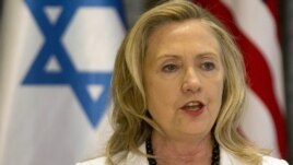 U.S. Secretary of State Hillary Clinton says United States will use "all elements" of its power to stop Iran from acquiring nuclear weapons.