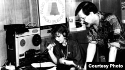 Ukraine--Julia Saiko-Ilienko and Andriy Haidamakha prepare a radio broadcast in the Kyiv bureau, undated.