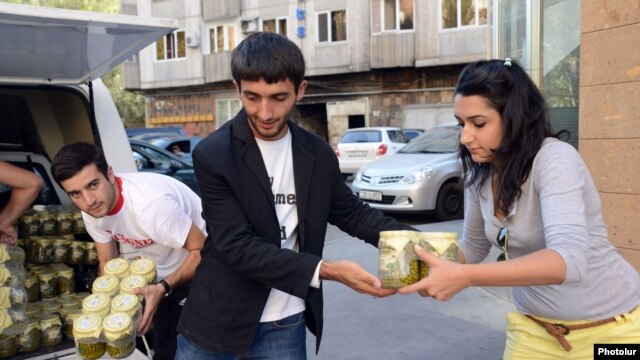 Armenia -- Young volunteers store humanitarian aid which is due to sent to Syria, Yerevan, 1Oct2012.