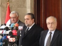 Oil Minister Hussain al-Shahristani (right) (RFE/RL)