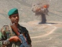 An Afghan soldier on guard as mines are destroyed on April 3 on the outskirts of Kabul (epa)