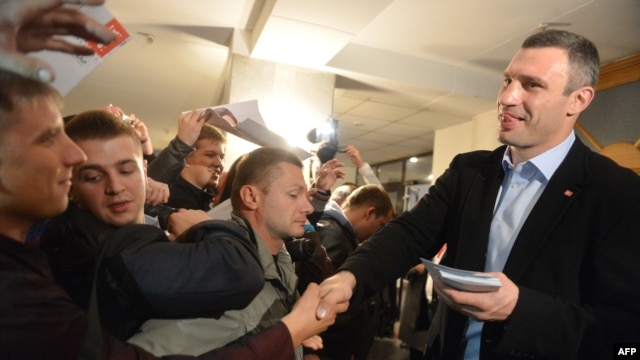 WBC heavyweight boxing champion-turned-politician Vitali Klitschko puts in some face time with prospective voters in mid-October.