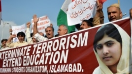 Pakistan -- Demonstrators chant slogans during a protest against the assassination attempt by the Taliban on child activist Malala Yousafzai in Islamabad, 16Oct2012