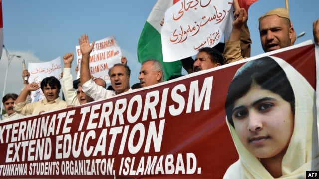 Pakistani demonstrators rally in Islamabad on October 16 against the assassination attempt by the Taliban on child activist Malala Yousafzai.