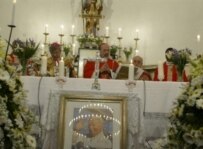 Catholics in Tehran attending a mass in memory of Pope John Paul II in April 2005 (AFP)