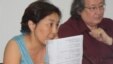 Айжангуль Амирова, активистка оппозиционного движения "Народный фронт" (слева).  