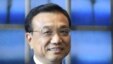 Chinese Vice Premier Li Keqiang stops to pose for a photo -- no questions, please! -- in Brussels on May 3.