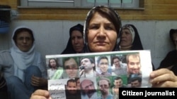 Mokhtare, shown above at a demonstration with other relatives of political prisoners, has been jailed for speaking out about her son's imprisonment. "We are protesting the imprisonment of our innocent children," she told Radio Farda.