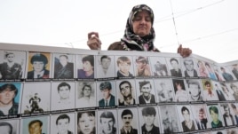 A member of the "Mothers of Srebrenica" demonstrates in front of the European Court of Human Rights (CEDH) in Strasbourg on October 11.  