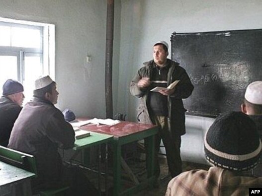 Tajiks study at a local religious school in Gisar in February 2007.