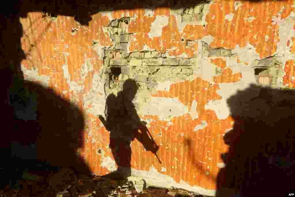 Iraqi soldiers patrol a suburb close to the area of Jweibah, east of the city of Ramadi, the capital of Iraq's Anbar Province. Iraqi forces declared victory in December in the battle for Ramadi after wresting back control of the city's central government complex from the Islamic State militant group. (AFP/Ahmad al-Rubaye)