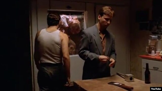 A famous scene from the pilot episode of "The Sopranos," in which Christopher Moltisanti (left) kills Czech "waste management" rival Emil Kolar (right) 
