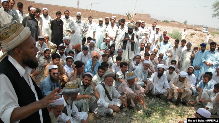 A Pashtun tribal leader addressing a jirga near the Khyber Pass.