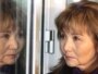 Сарa Сагиндыкова, супруга Талгата Кыстаубаева, в ожидании вестей о приговоре ее мужу. Астана, 12 марта 2010 года.