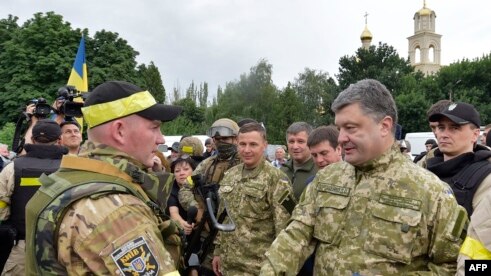 Poroshenko speaking to Ukrainian soldiers in Slovyansk on July 8.