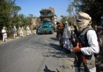Pro-Taliban militants line a road in the Swat Valley in October (AFP)