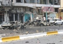 The site of a car bomb explosion at Al-Mansur district in western Baghdad, September 12, 2006 (epa)