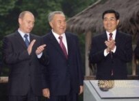Presidents of Russia, Kazakhstan, and China (left to right) at SCO summit in Shanghai in June (epa)