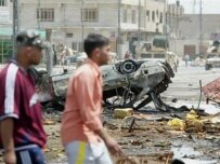 The results of a May 6 car bombing in Baghdad (AFP)