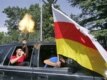 South Ossetian men celebrate the recognition of South Ossetia in Tskhinvali