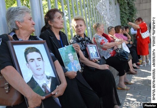 Armenia -- Relatives of the victims of the March 2008 unrest protest outside parliament. 15Sept2009