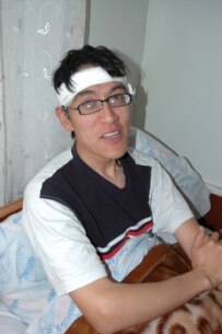 Baisalov in hospital on April 13 (Courtesy Photo)