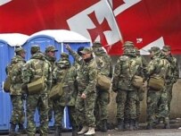 Soldiers near the parliament bulding in central Tbilisi (AFP)