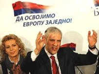 Boris Tadic celebrates victory with his wife on February 3 (AFP)