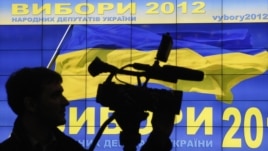 A cameraman works at a demonstration of a system to monitor the voting during the Ukrainian parliamentary election, in Kiev October 24, 2012.