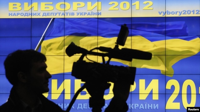 A cameraman works at a demonstration of a system to monitor the voting during the Ukrainian parliamentary election, in Kiev October 24, 2012.