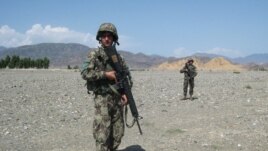 Soldiers from the Afghan National Army (ANA) patrol the vicinity of Jalalabad.