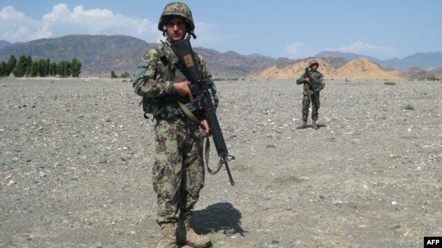 Soldiers from the Afghan National Army (ANA) patrol the vicinity of Jalalabad.