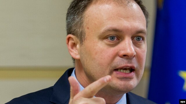 Moldovan Parliament speaker Andrian Candu speaks during his briefing in Parliament in Chisinau on January 29.