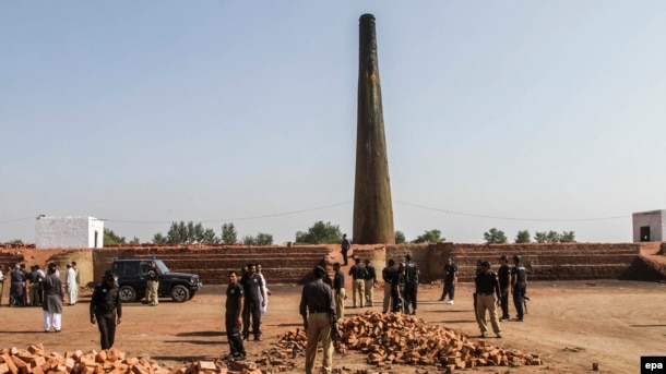 Pakistani Police inspect the brick kiln where a Christian couple was burned alive for alleged blasphemy in November 2014.