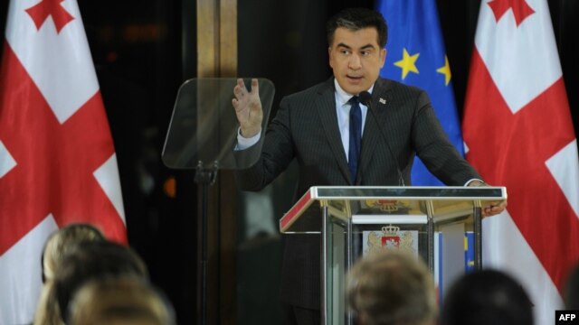 Georgian President Mikheil Saakashvili speaks in Tbilisi on February 8, after being forced to deliver his address from the presidential residence because protesters prevented access to the the National Library.