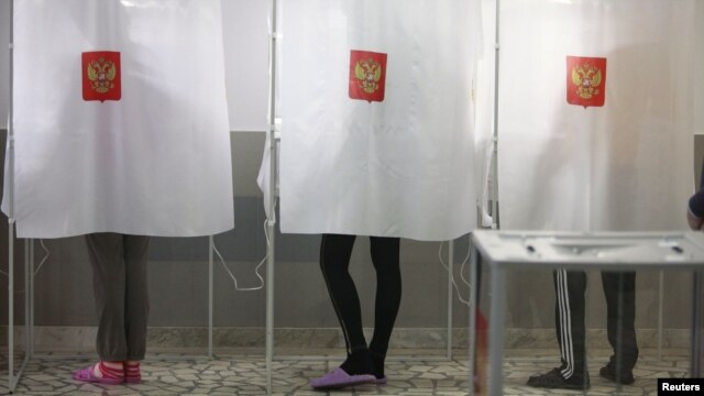 Russian voters cast ballots in the March presidential election.
