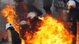 Массовые митинги, забастовки поджоги и столкновения с полицией - так простые греки встречают принятие парламентом мер жесткой экономии