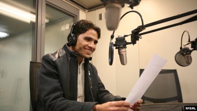 Asadullah Lodin, an Afghan student and aspiring journalist, practices his on-air skills during a media training at RFE/RL's Prague headquarters.
