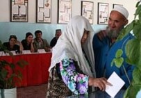 A woman casts her ballot in the Tajik capital, Dushanbe, in the November 6 presidential election (OSCE)