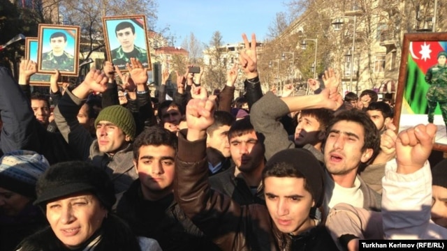 Twenty-one men have been fined for participating in a Baku demonstration to raise awareness about the deaths of army conscripts.
