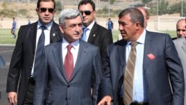Armenia - President Serzh Sarkisian and businessman Ruben Hayrapetian (R) visit a football academy in Yerevan, 1Sep2010.
