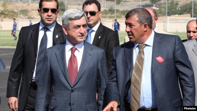 Armenia - President Serzh Sarkisian and businessman Ruben Hayrapetian (R) visit a football academy in Yerevan, 1Sep2010.