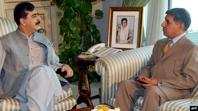 Inter Services Intelligence (ISI) chief Ahmed Shuja Pasha (right, with Prime Minister Yousaf Raza Gilani) will hope to clear the air with his CIA counterpart in Washington.